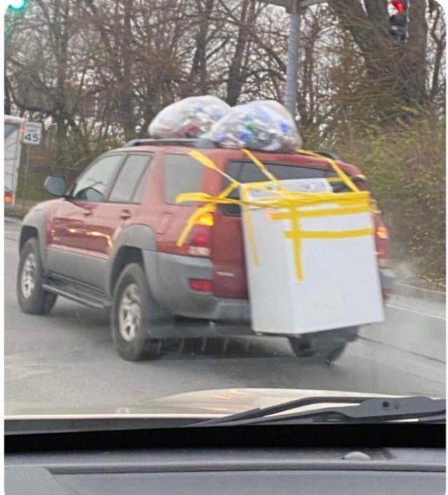 coche con lavadora pegada