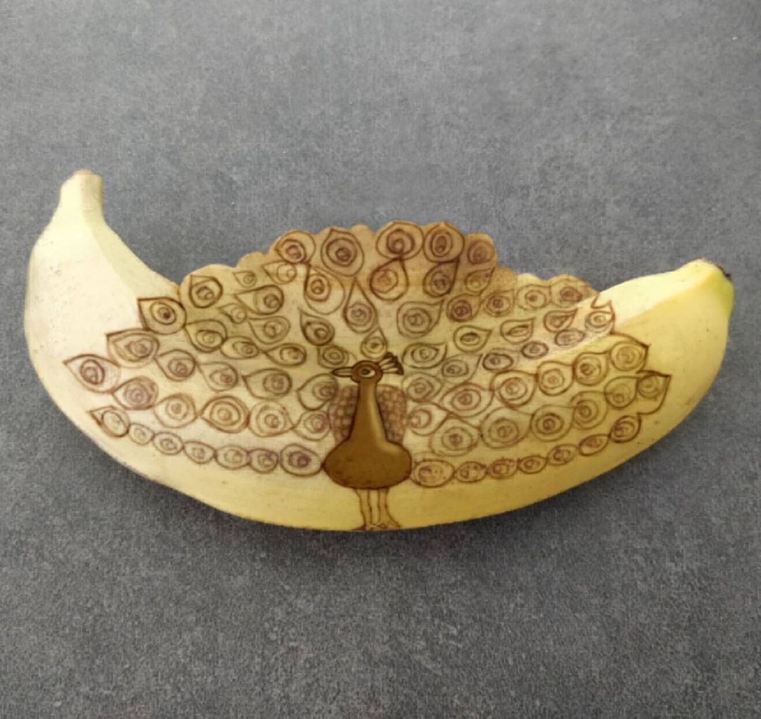 pavo real en platano